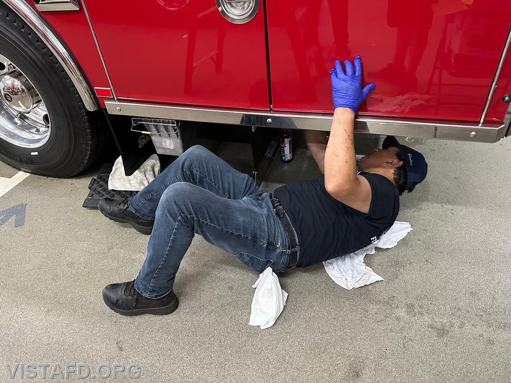 Firefighter Martin Rojas cleaning Tanker 4