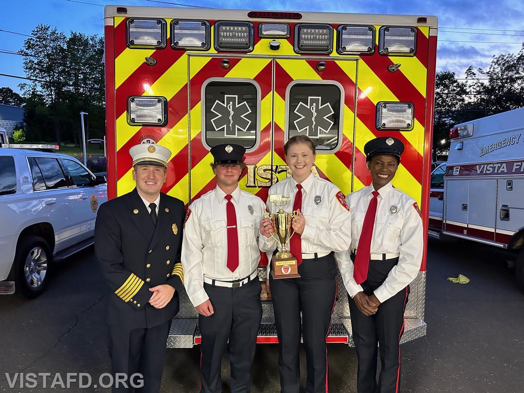 The 84B1 crew and Chief Jeff Peck with the Best Ambulance Trophy