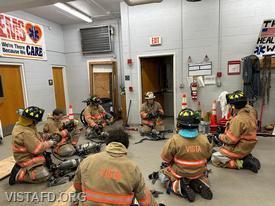 Assistant Chief Mike Peck going over how to use the SCBA with our Vista Firefighters