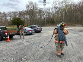 Vista Firefighters practicing hoseline advancement during "Firefighter Skills Class"