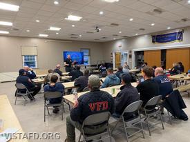Bryan Doyle of Signal 73 Fire Training leads the "Shocking Developments: EV & Lithium-Ion Battery Incidents" drill