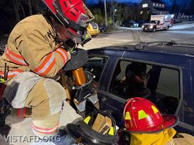 Vista Fire Department personnel performing patient removal during extrication operations