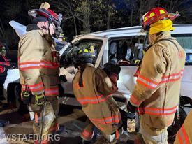 Foreman Kyla Whalen operates hydraulic tools during the “Extrication with Victim Removal – Doors and Dash Displacement” drill