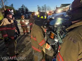 Probationary Firefighter Max Nierenberg operating the cutters
