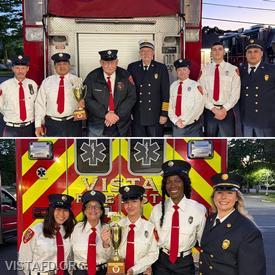 The Engine 142 and Ambulance 84B1 crews pose with their Best Fire Apparatus and Best Ambulance trophies at the 2026 Vista Fire Department Annual Dinner