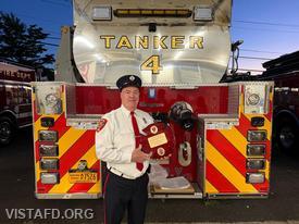 Firefighter Steven Woodstead being honored for 45 years of service