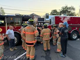 Lead Foreman Mike Peck demonstrating hoseline advancement operations from Tanker 4