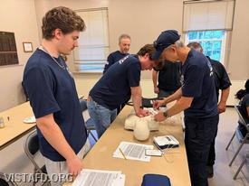 Foreman Grant Vialardi and Firefighter/EMT Andy Korman practicing CPR