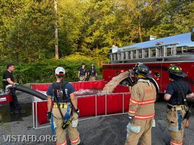 Vista Tanker 4 dumping water into the portable pond during our "Pump Operations: Drafting Without a Dry Hydrant" drill