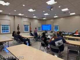 CIC Dani Garavito reviewing Pediatric Emergencies and Car Seat Operations with Vista EMS personnel