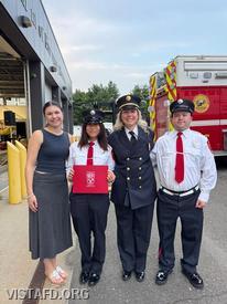 Probationary EMT Sophia La Magna, Probationary Firefighter/EMT Candidate Hanna Zhao, Lt. Elly Hersam, and Lead Foreman Ryan Ruggiero at the Westchester County Department of Emergency Services Firefighter I Graduation Ceremony