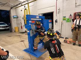 Lead Foreman Mike Peck and Ex-Chief Bill Dingee reviewing forcible entry techniques with our Vista Firefighters