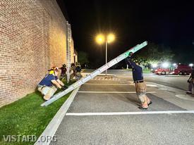 Vista Firefighters practicing ladder operations